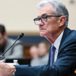 Fed Chair Says Central Bank Need Not ‘Hurry’ to Cut Rates